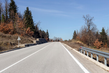 A picturesque highway in the high mountains (Greece, Epirus) on a sunny winter day