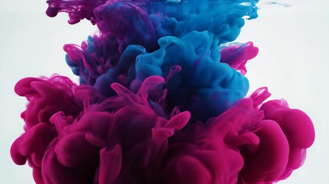 Red Ink Spreads and Flows in Water on White Background