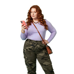 Woman in purple shirt and camo pants holding a smartphone