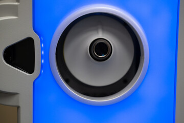 A close-up view of the illuminated laser arm aperture on the ZEISS VISUMAX 800, which is the precise docking and connection point for the disposable suction cap (contact glass) used in refractive