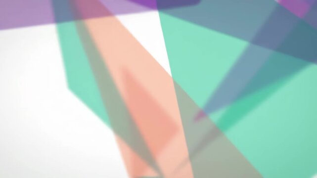 Abstract pastel colored triangle shapes overlapping on white