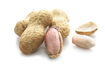 raw peanuts pods isolated on a white background