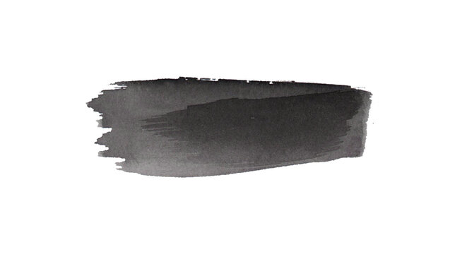 A simple black ink brush stroke. A creative graphic of a black brush stroke in gray scale 