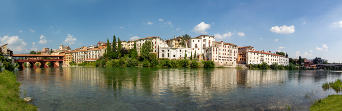 view to historic skyline of Bassano del Grappa with the Old wooden Bridge, also called ponte degli Alpini, Italy