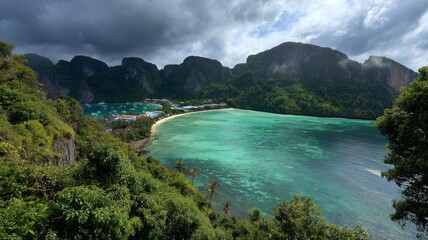 Scenic view of loh samah bay with turquoise waters, limestone cliffs, and lush tropical vegetation on phi phi island, thailand, featuring calm seaside reflections and clear sky