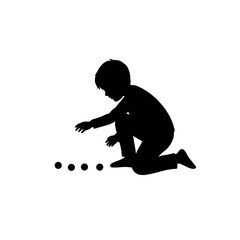 Silhouette of a young boy playing with marbles on a white background.