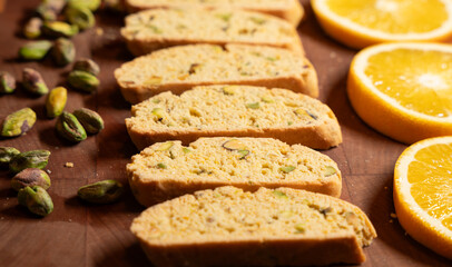 Gourmet Biscotti with Fresh Citrus and Nuts on a Wood Board