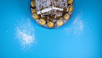 Overhead Gingerbread House and Snowflakes with Large Negative Space Below