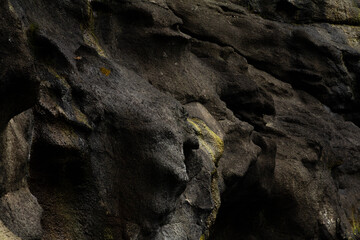 Large rock in the waters of Gjógv harbor.
