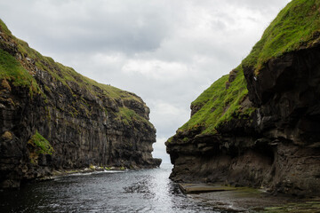 Scenic view of Gjógv harbor in the Faroe Islands.