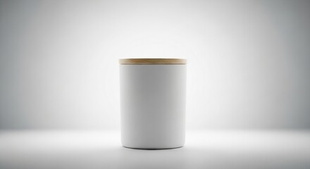 Minimalist white candle jar with natural wooden lid positioned cleanly against soft blurred background surface