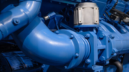 Industrial large gas diesel electric generator bottom up view, industrial background.