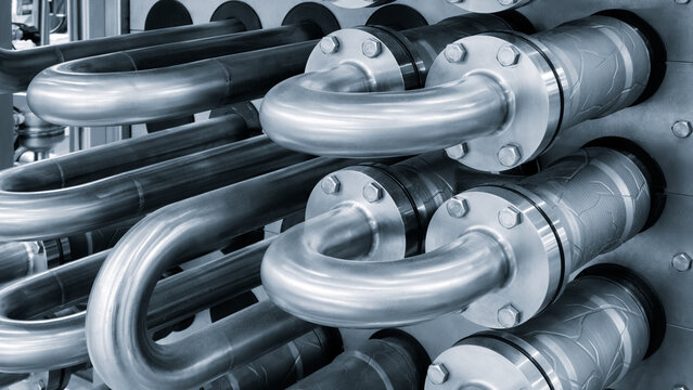 Food production machine with stainless steel pipes, cooling radiator as separator and tanks, valves and measuring instruments.