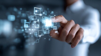 A close-up of a business person's hand interacting with a digital interface, showcasing innovation and technology