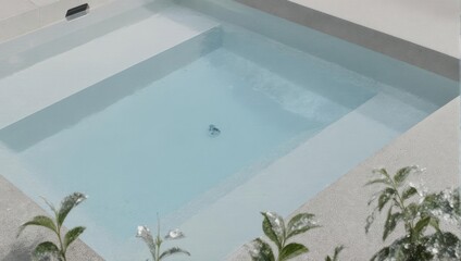 Modern Rectangular Swimming Pool with Clear Blue Water and Tiled Surround.