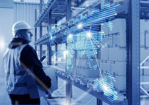 Global supply chain worker oversees warehouse inventory, handling packages while digital world map links highlight international distribution and logistics connectivity.