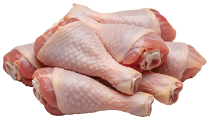 Pile of fresh raw chicken drumsticks with skin isolated on transparent background