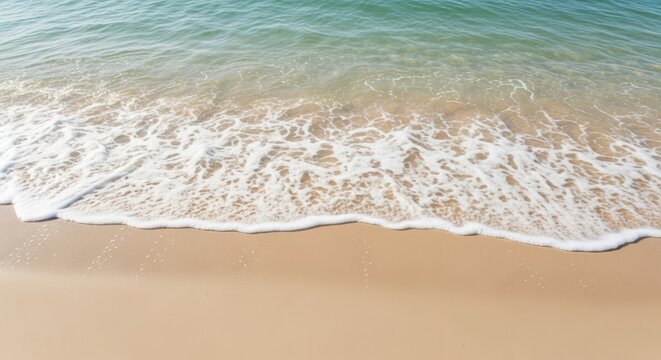 Tranquil ocean waves gently washing onto pristine sandy beach shoreline - Powered by Adobe