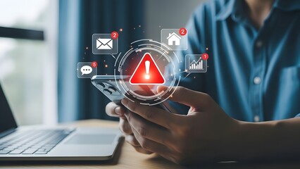 Person holding phone with warning alert and security icons overlaid on screen