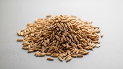 Pile of natural golden oat kernels for healthy food