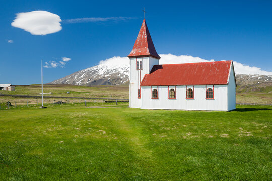 Church of Hellnar in western Iceland with the vulcano Snaefellsjokull in background