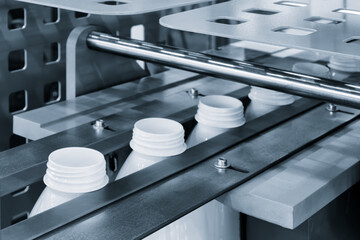 Machine for producing plastic beverage bottles using extrusion method from plastic preformed PET...