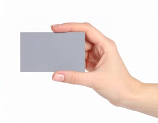 Obraz premium Hand holding an empty business card over white background, presentation mock up template