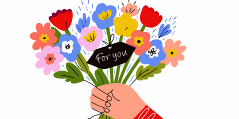 Hand holding a colorful bouquet of flowers with a tag saying for you