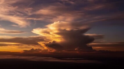 Golden Hour Cloud Dynamics: Showcasing the breathtaking interplay of sunlight and clouds during sunrise or sunset, creating vibrant hues and deep shadows. - Powered by Adobe