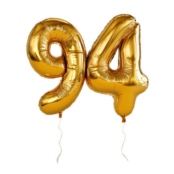 A pair of gold balloons with the number 94 on them