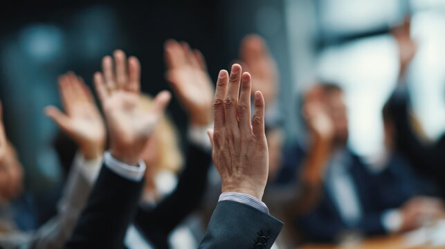 Team of Executives Raising Hands to Show Support