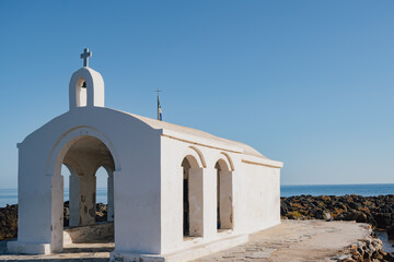 Iconic seaside chapel: the small church of Agios Nikolaos standing on a pier in Georgioupoli, Crete