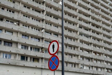Eastern European Brutalist Residential Building Facade with Traffic Signs