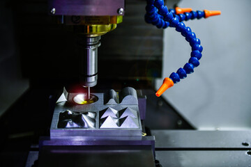 Spindle cutting tool Rotary 5-axis CNC milling machine during deburring of engine parts, heavy industry plan	