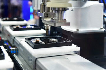 Automatic machinery for assembling and inspecting hard disk drives in the production line	