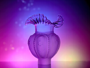 A decorative lamp shade with colorful background