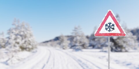 Snow and ice warning roadsign in front of winter road background with snow with copy space