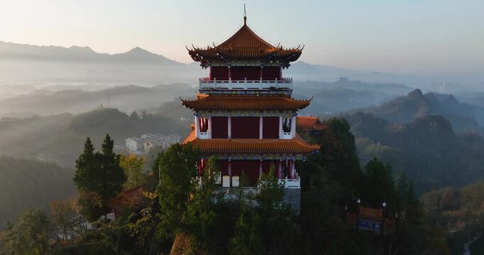 Sunrise and ancient chinese buddha temple landscape in Hunan province,China