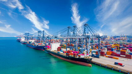Global transport cargo and logistic business import and export, Container ship in seaport terminal, Container cargo vessel freight shipping company commercial worldwide, Freight transportation ship. © William