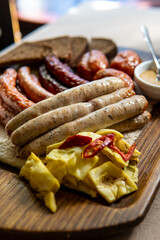 Grilled Sausages Platter with Pickled Cabbage