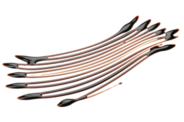 Balsamic glaze design isolated on black background macro view detailed