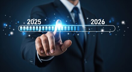 Businessman presses button progress bar from 2025 to 2026