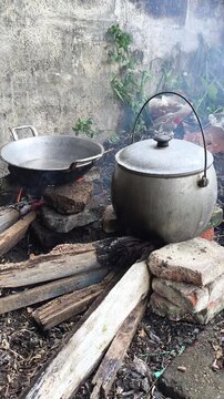 Cooking Traditional Indonesian Liwet Rice on a Wood-Fired Stove.