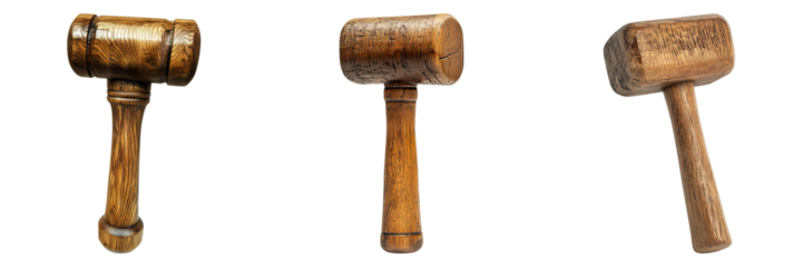 Three vintage wooden mallets, each showing unique wear and tear