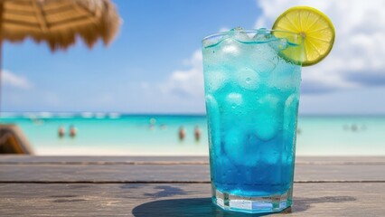 Refreshing blue cocktail on a wooden table at a tropical beach resort.