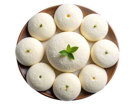  Top-Down View of Soft Plain Idlis Arranged in Circular Pattern, isolated on a transparent background.