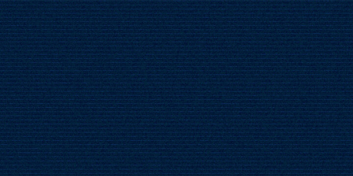 Navy blue cotton fabric pattern close up as background. Denim blue grunge textured seamless pattern. Dark navy blue denim jeans.