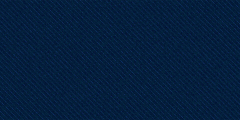 Navy blue cotton fabric pattern close up as background. Denim blue grunge textured seamless pattern. Dark navy blue denim jeans.