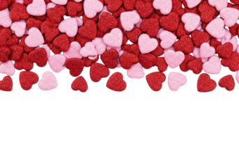 Scattered crimson red and ballet pink glitter heart border on a transparent background, viewed close-up with sharp focus, large copy space below. concept for romantic holiday template