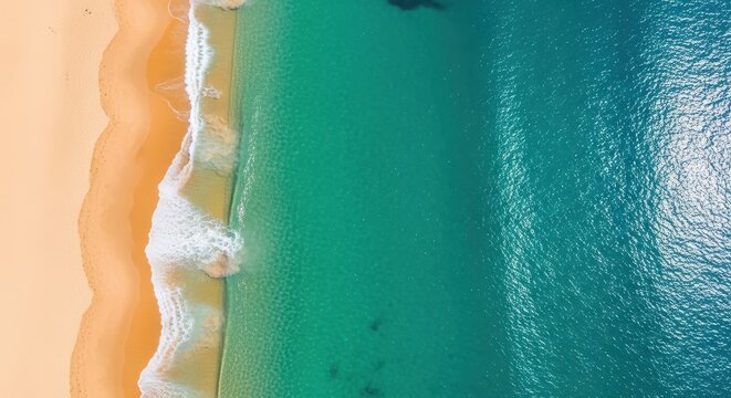 Aerial seascape capturing the meeting of turquoise water and golden shorelines serene scene